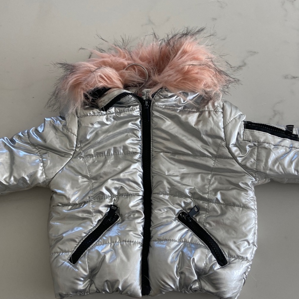 Gently worn urban republic metallic silver jacket with pink fur size 3t